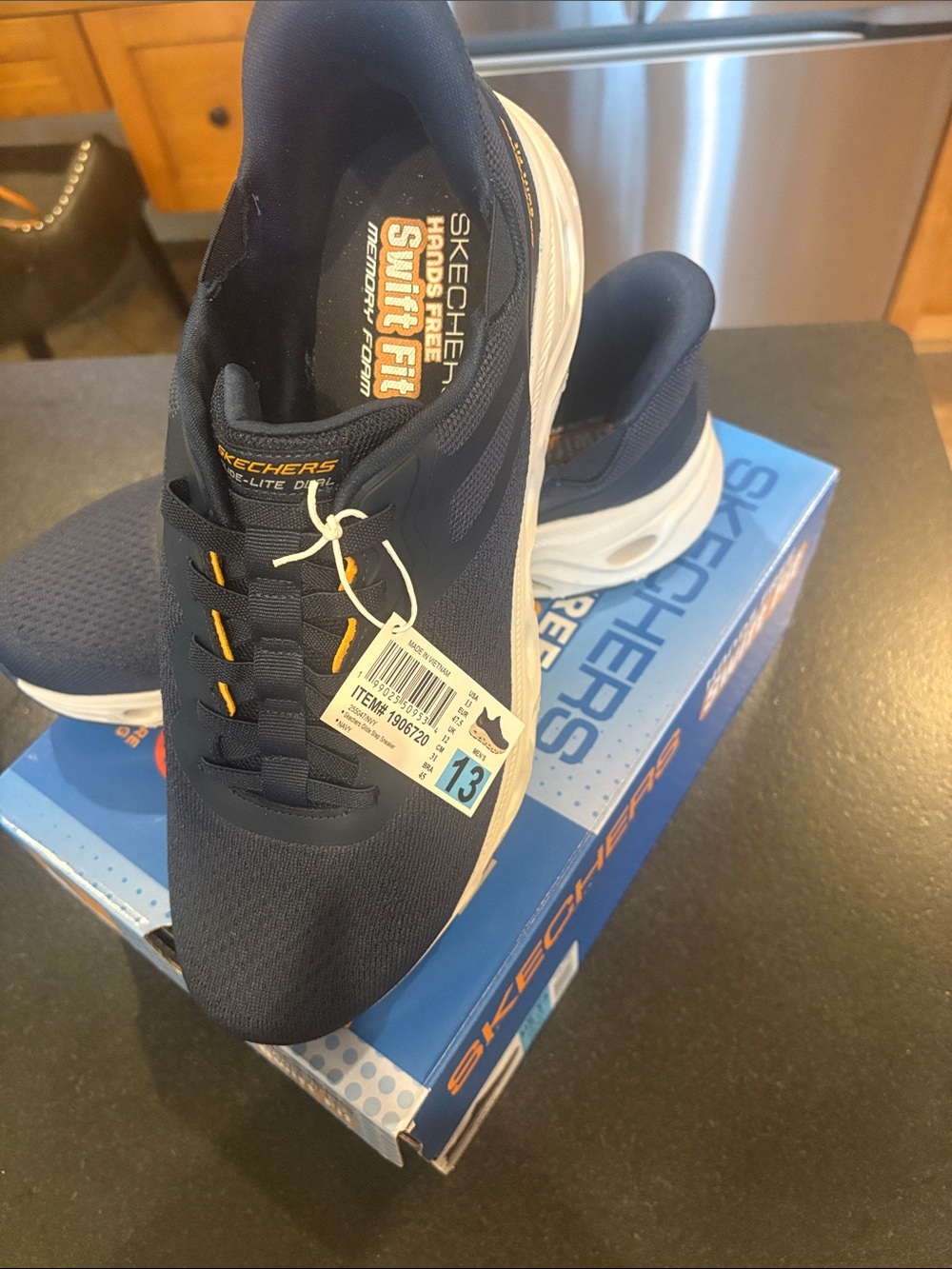 Skechers Men’s Navy Athletic Slip-On Sneakers with Yellow Eyelet Accents
